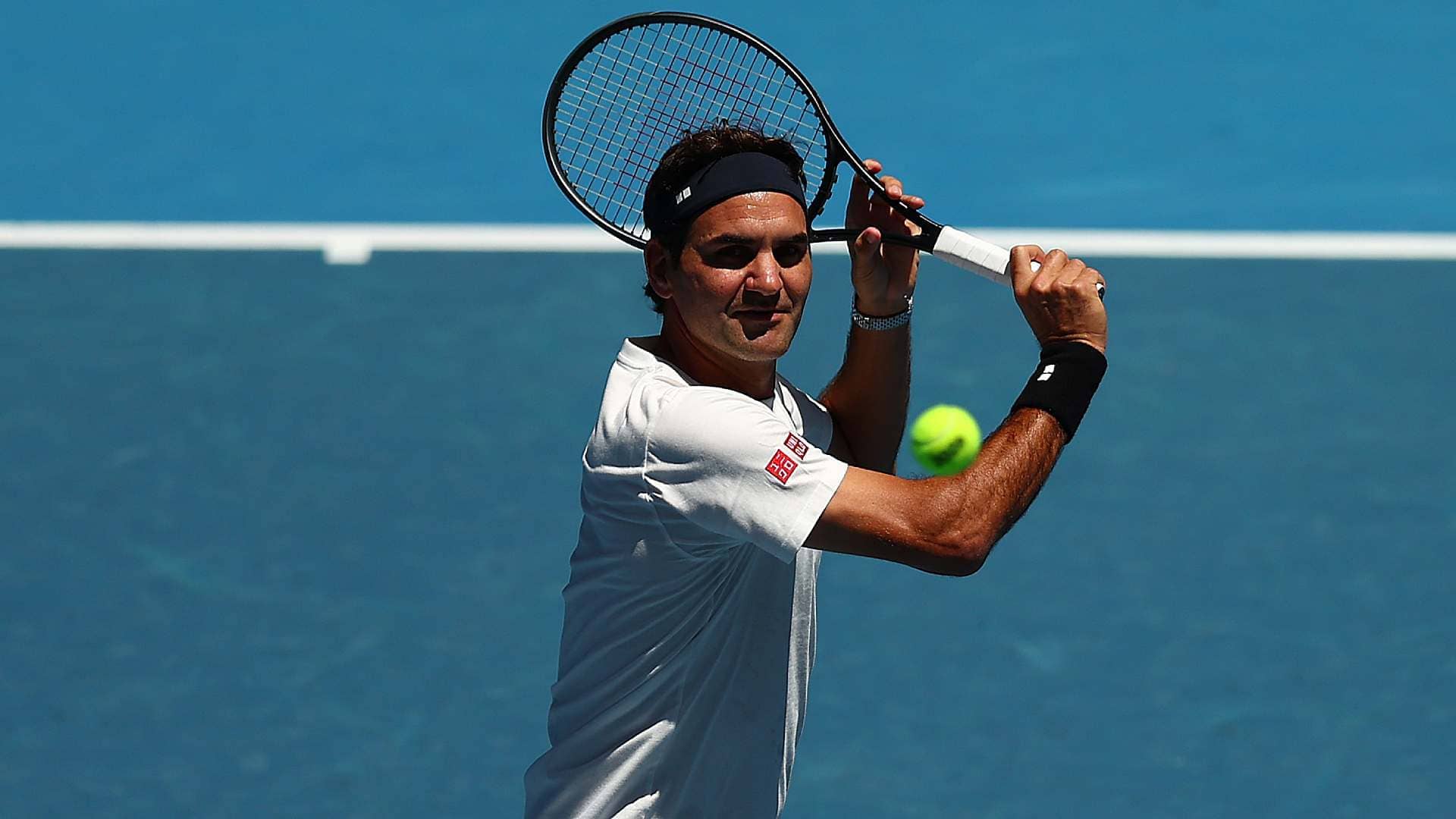 L’allenamento è un sogno che riempie Melbourne Park: insieme a Ruud c’è Roger Federer